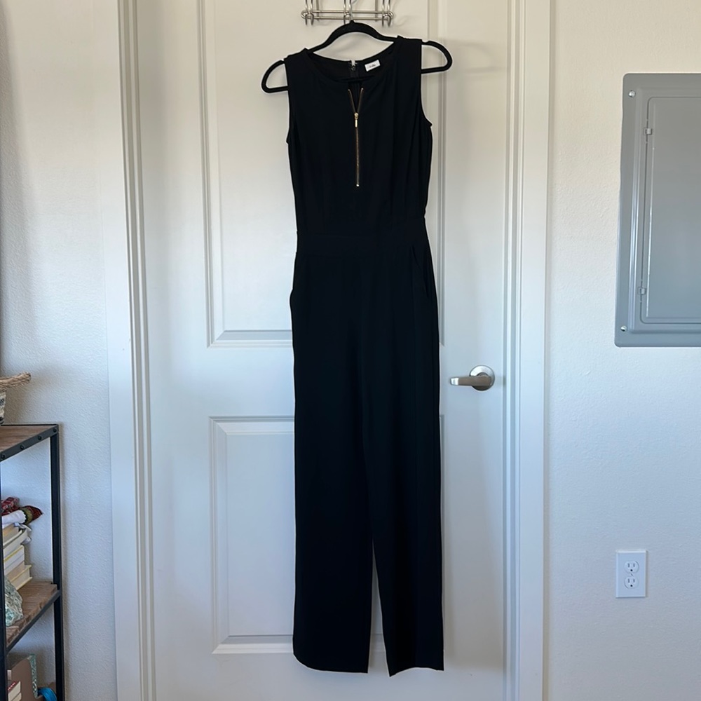 cabi, black jumpsuit with gold zipper details, size 0